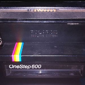 An old one step 600 Polaroid camera